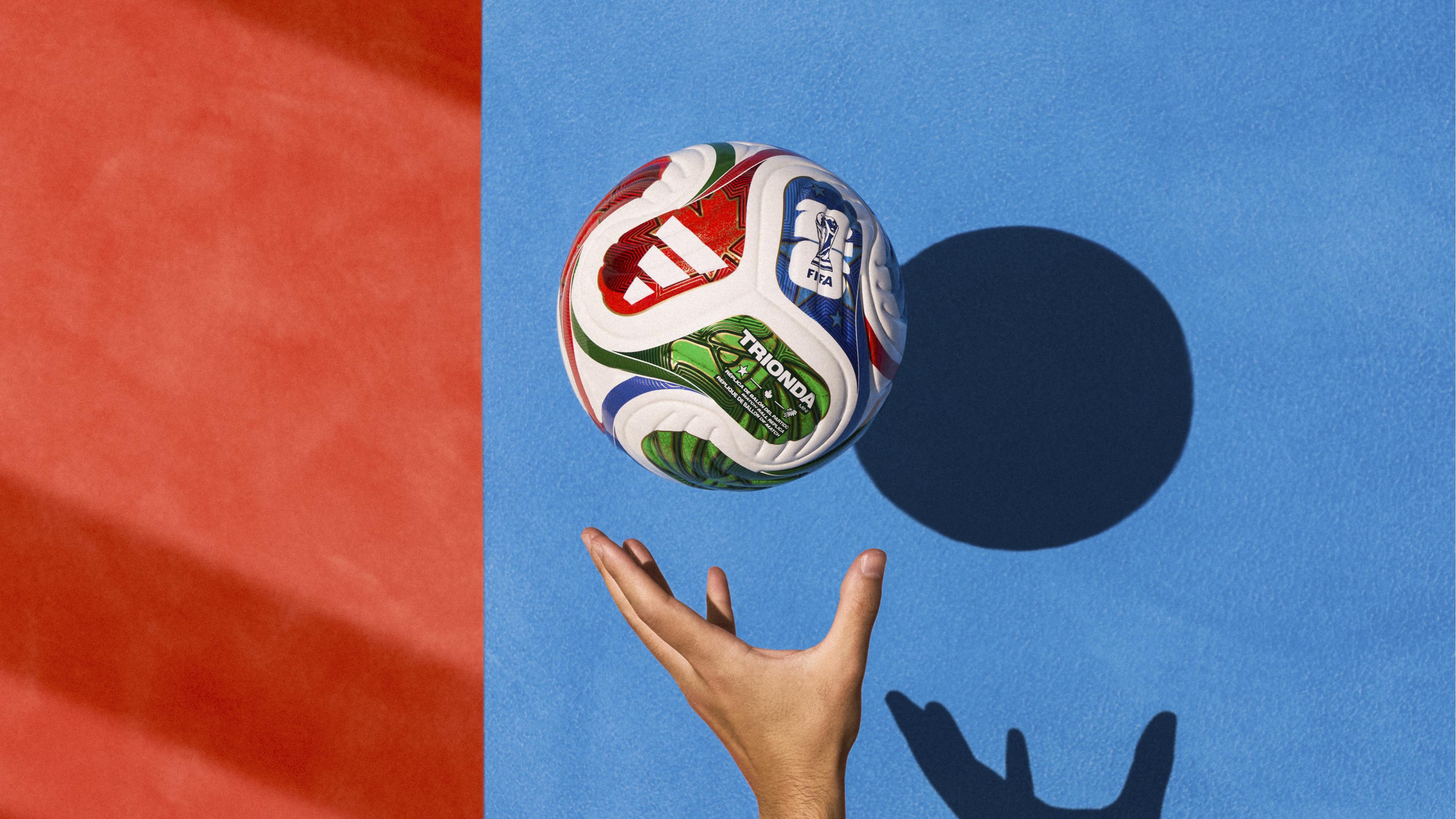 hand catching soccer ball 