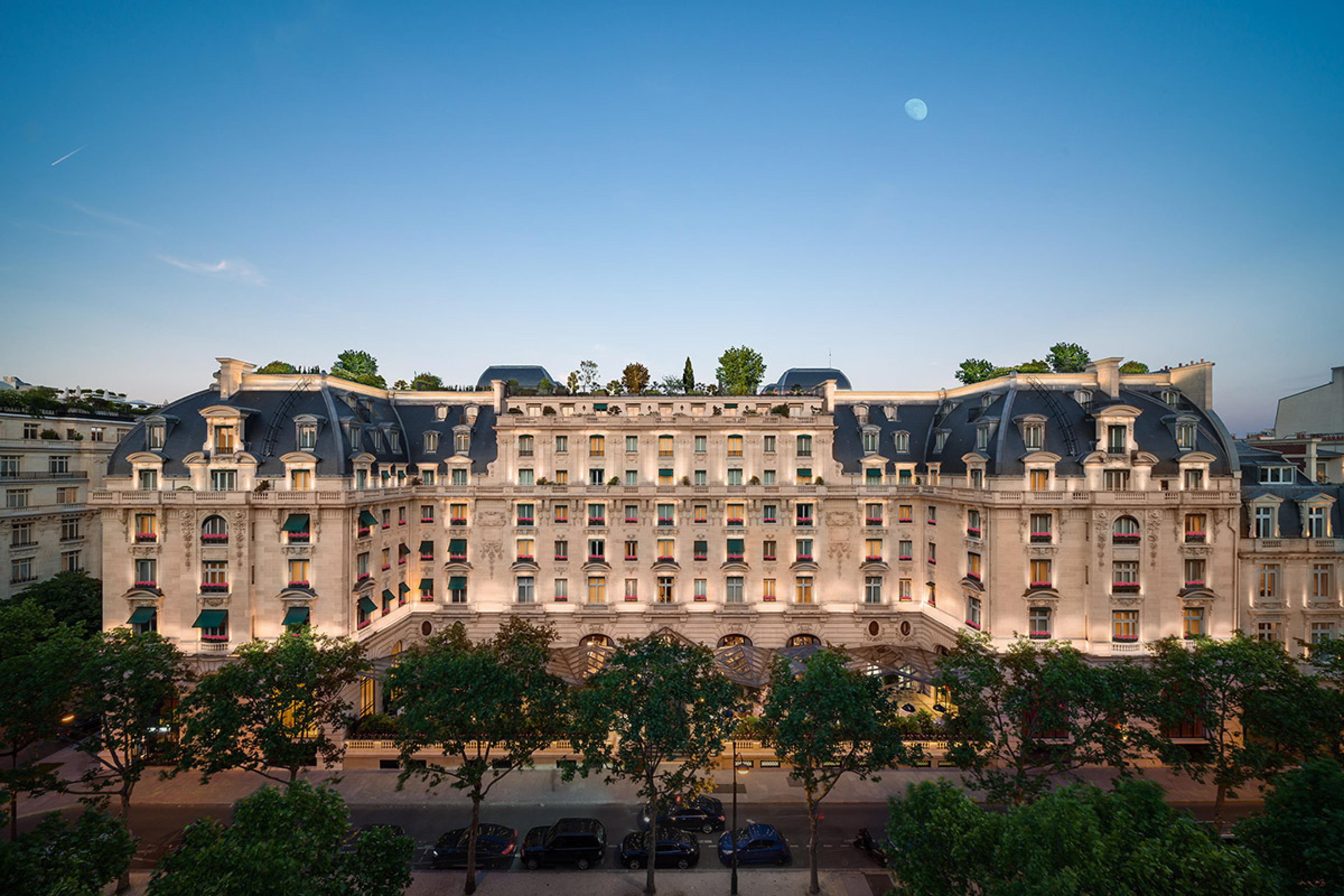 exterior of grand hotel in paris haussmann style building